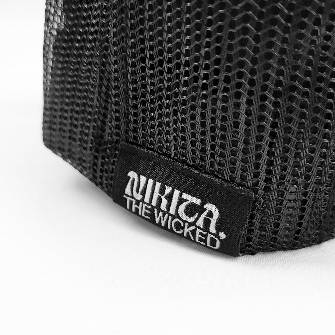 Nikita, the Wicked - Conductor Trucker hat